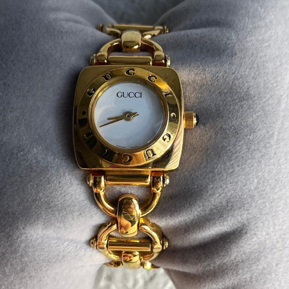 Gucci Women's Gold Watch with White Dial